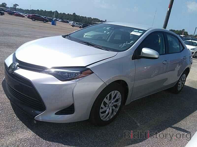 Photo 5YFBURHE6KP922069 - Toyota Corolla LE 2019