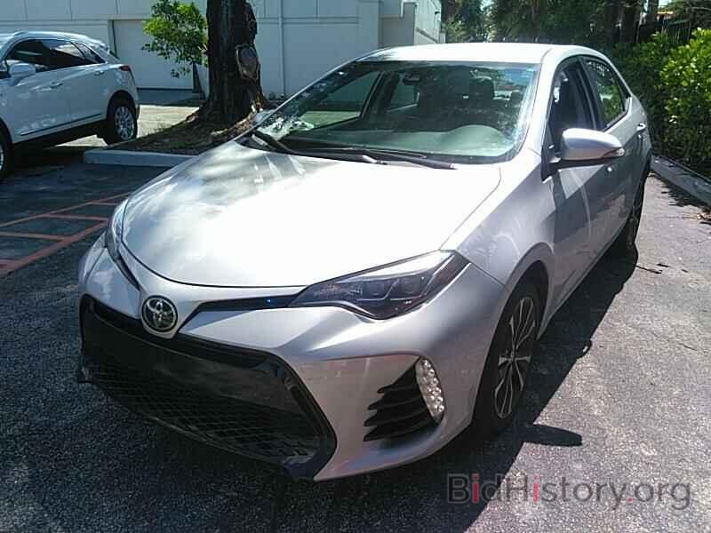 Photo 5YFBURHE8KP897689 - Toyota Corolla 2019