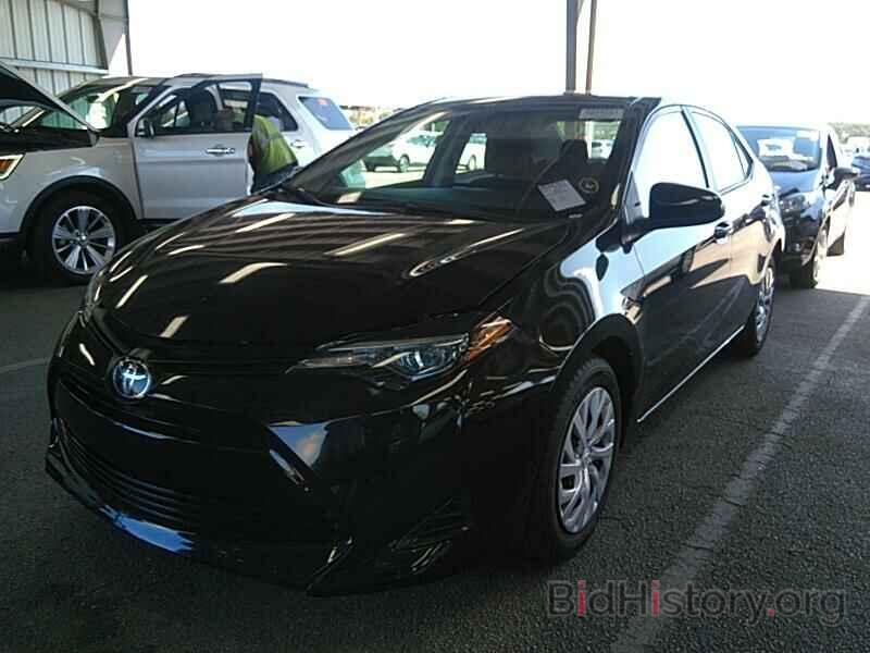 Photo 5YFBURHE8KP935812 - Toyota Corolla LE 2019