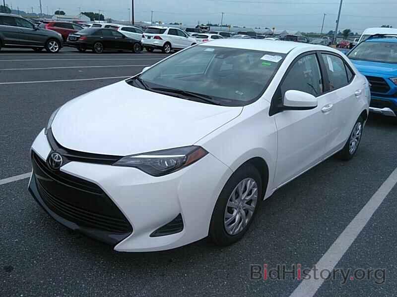 Photo 5YFBURHE8KP928066 - Toyota Corolla LE 2019