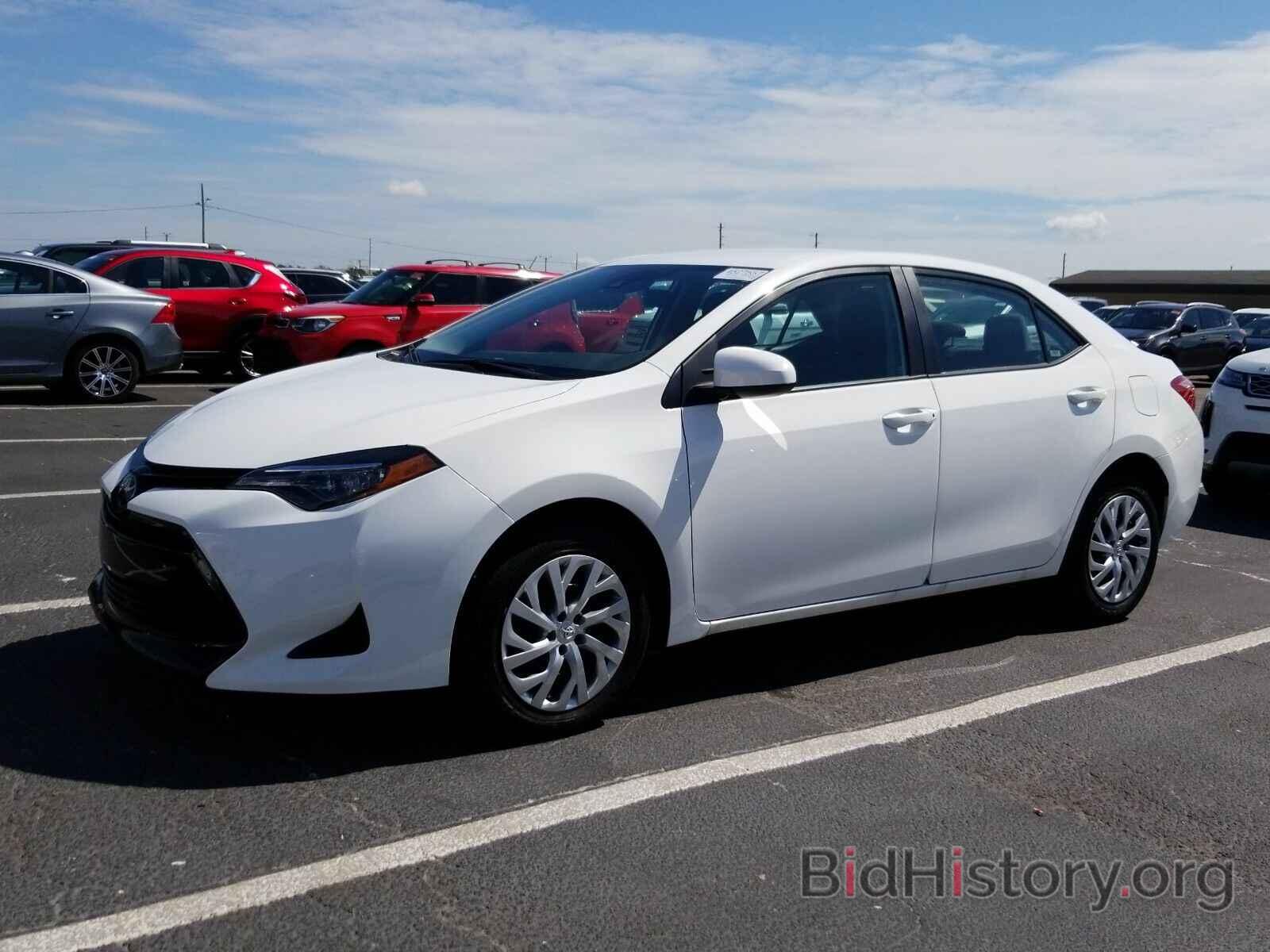 Photo 5YFBURHE5KP921513 - Toyota Corolla LE 2019