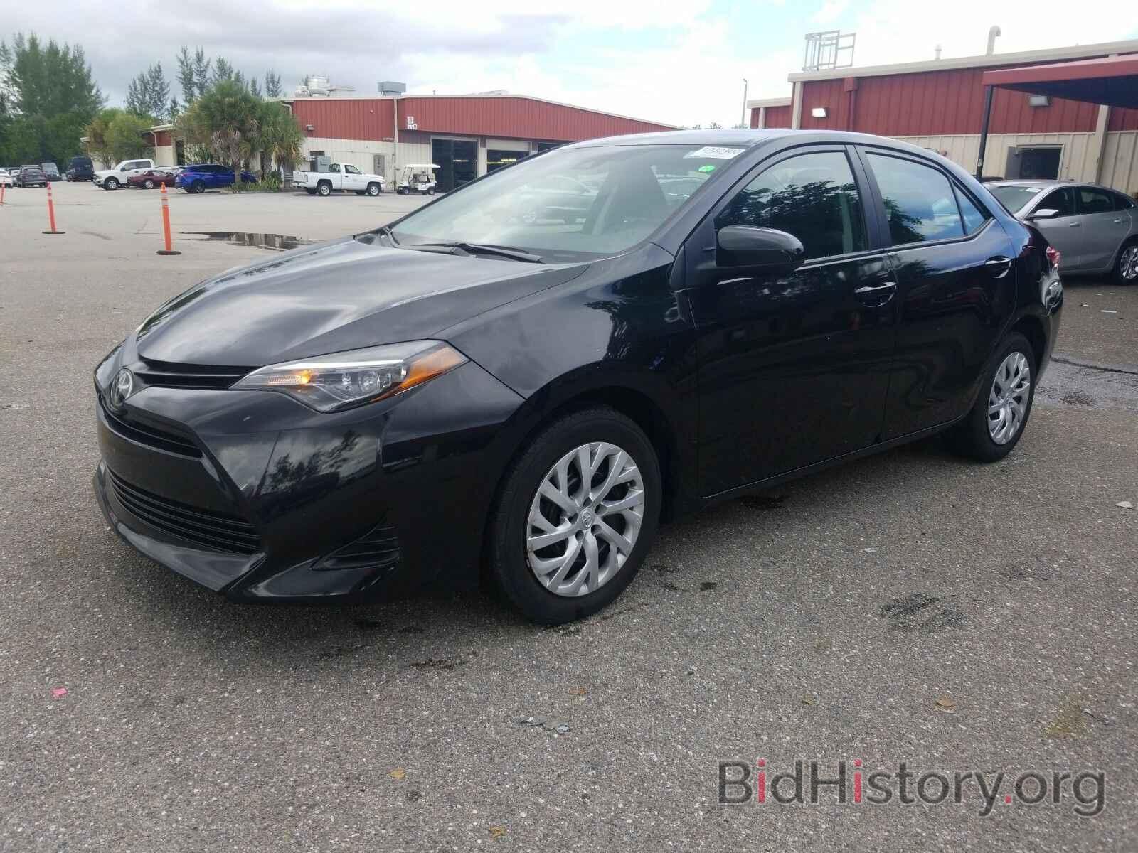 Фотография 5YFBURHE0KP919359 - Toyota Corolla LE 2019