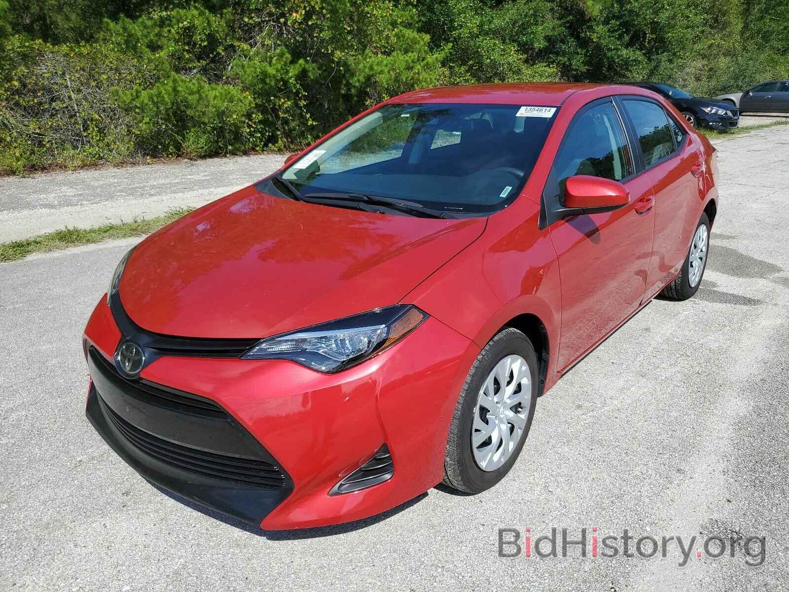 Photo 5YFBURHE7KP909380 - Toyota Corolla LE 2019