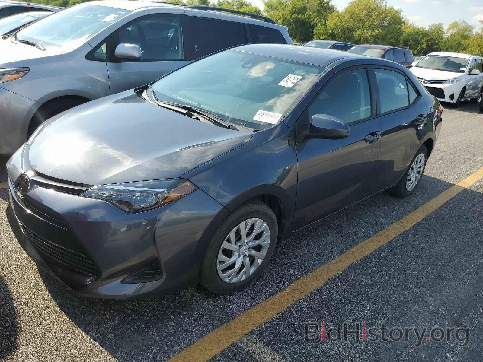 Photo 5YFBURHE2KP900084 - Toyota Corolla LE 2019