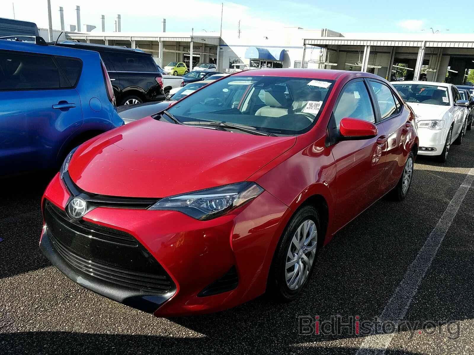 Photo 5YFBURHE9KP931526 - Toyota Corolla LE 2019