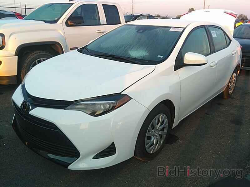 Photo 5YFBURHE1KP928491 - Toyota Corolla LE 2019