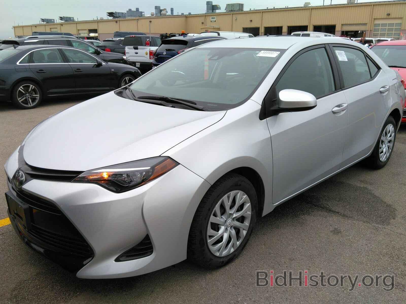 Photo 5YFBURHE4KP897611 - Toyota Corolla LE 2019