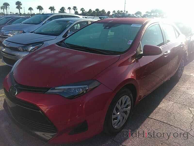 Photo 5YFBURHE2KP860797 - Toyota Corolla LE 2019