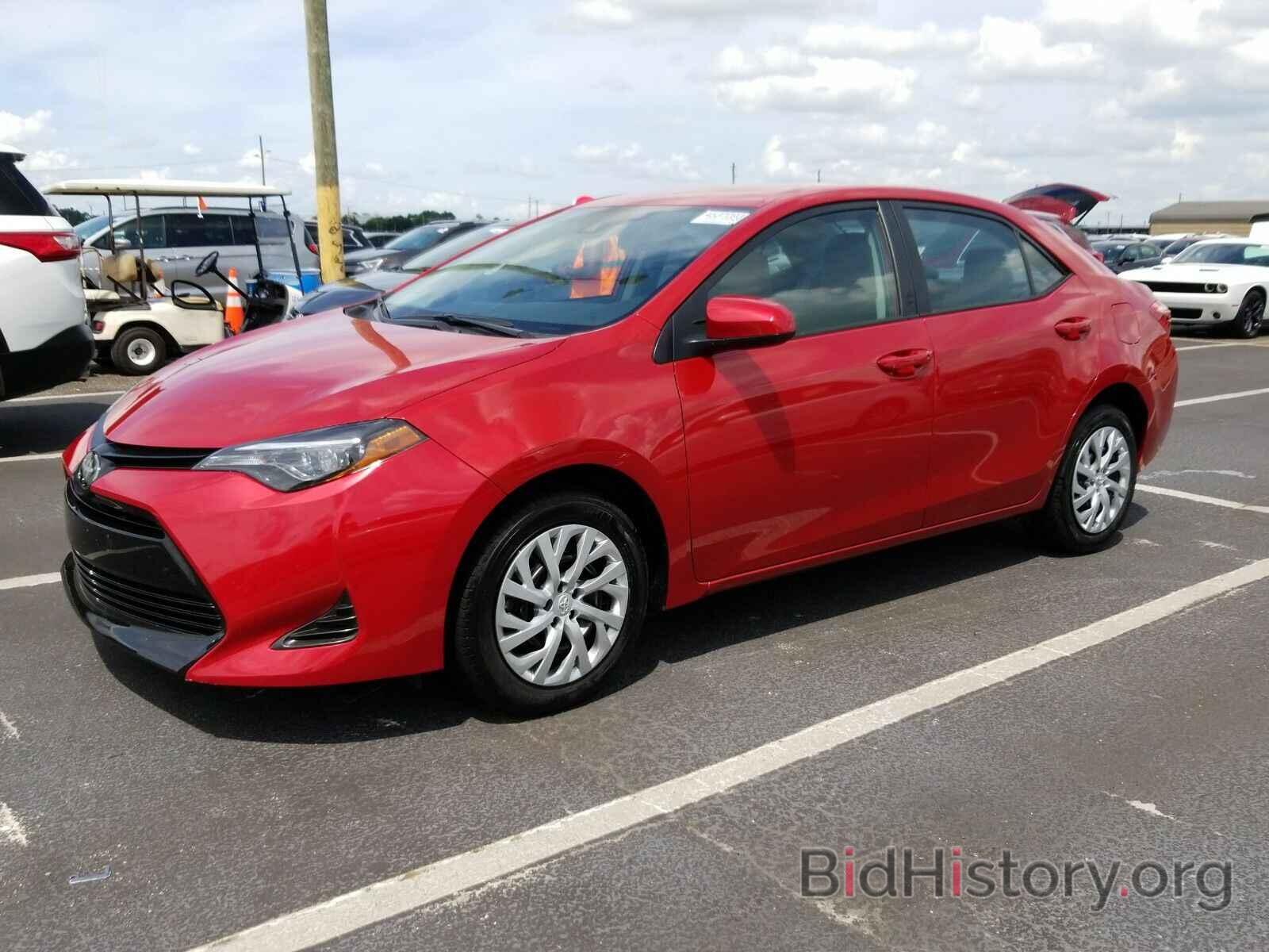 Photo 5YFBURHE9KP938962 - Toyota Corolla LE 2019