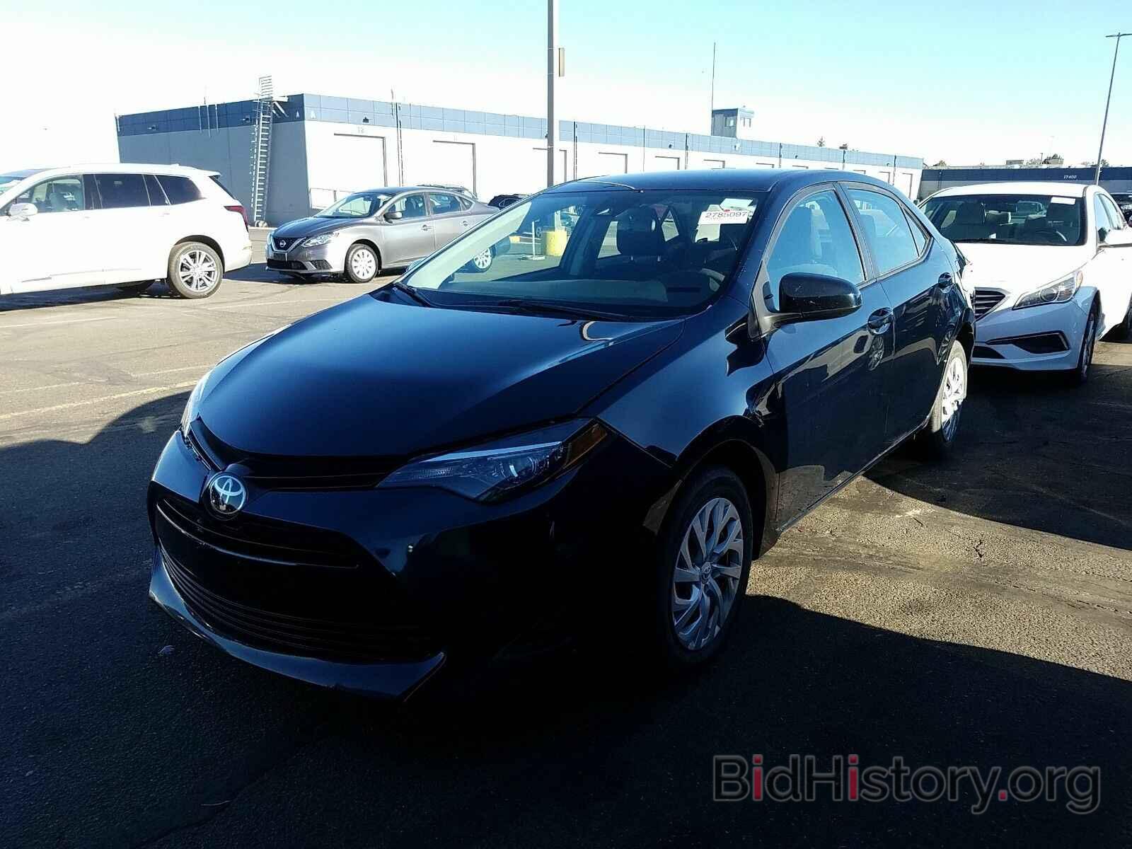 Photo 5YFBURHE8KP931968 - Toyota Corolla LE 2019