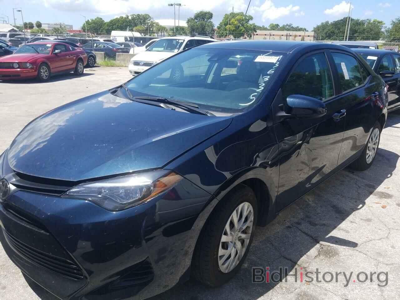 Photo 5YFBURHE5KP936335 - Toyota Corolla LE 2019