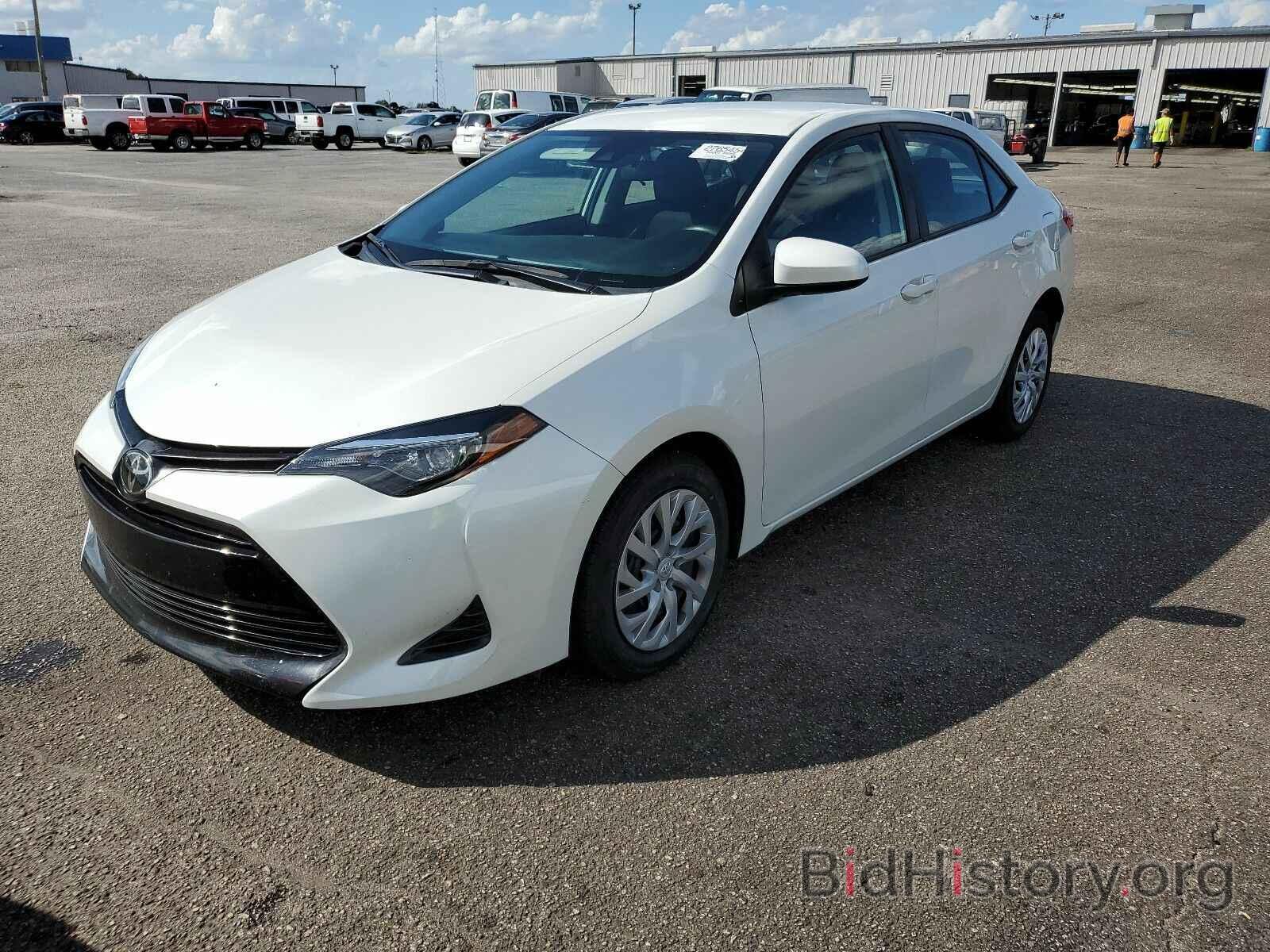 Photo 5YFBURHE1KP924859 - Toyota Corolla LE 2019