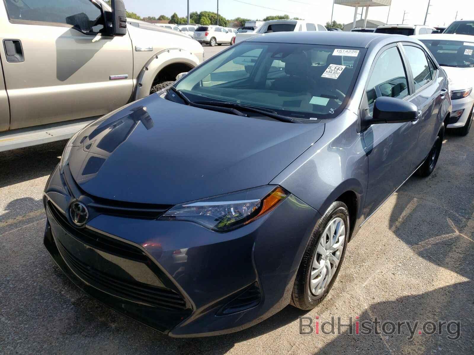 Photo 5YFBURHE8KP886269 - Toyota Corolla LE 2019