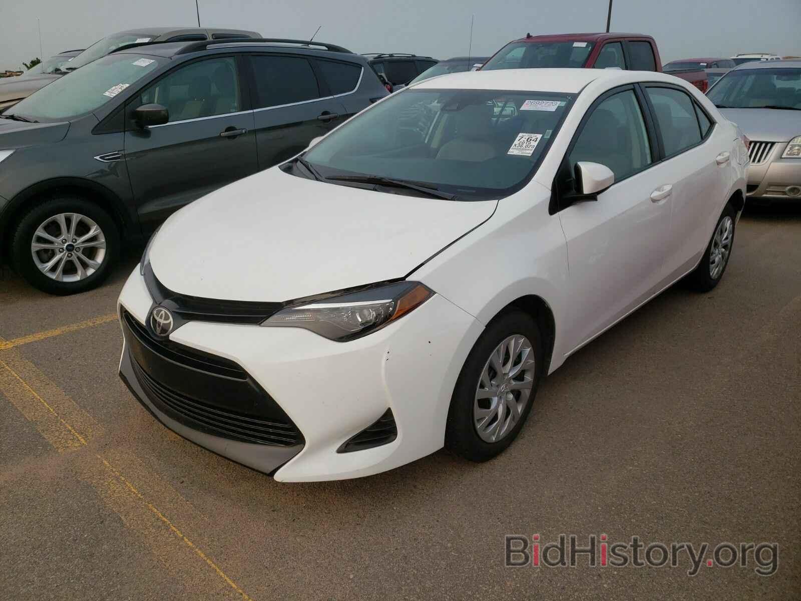 Фотография 5YFBURHE0KP934380 - Toyota Corolla LE 2019