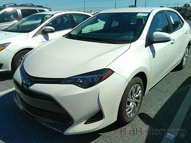 Photo 5YFBURHE8KP905127 - Toyota Corolla LE 2019