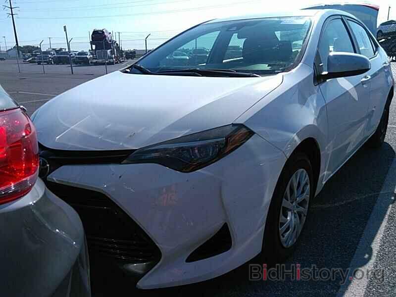 Photo 5YFBURHE7KP937860 - Toyota Corolla LE 2019