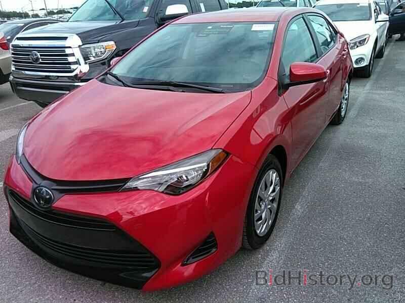 Photo 5YFBURHE0KP949235 - Toyota Corolla LE 2019