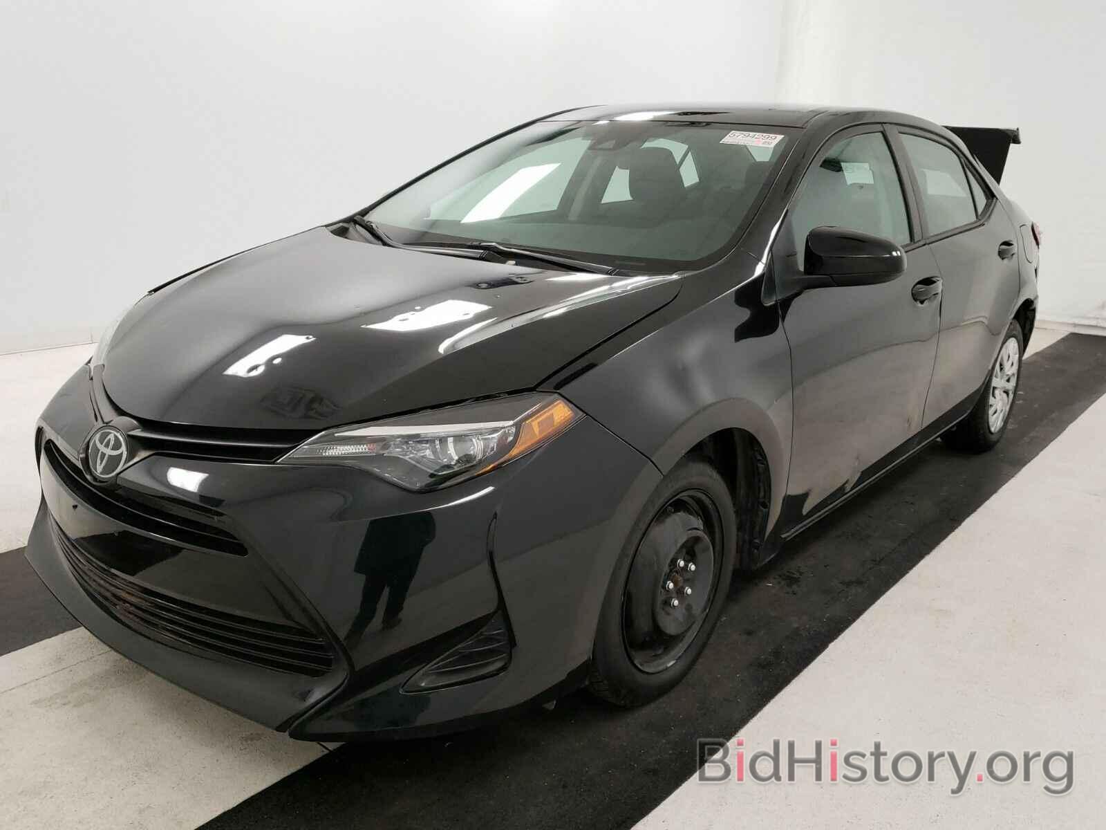 Photo 5YFBURHE4KP892568 - Toyota Corolla LE 2019