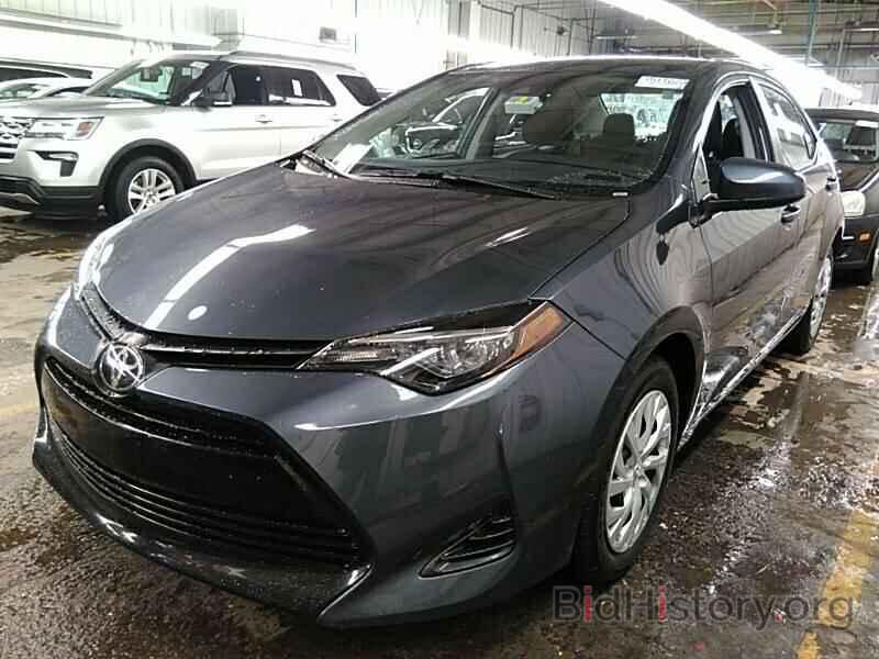 Photo 5YFBURHE4KP884907 - Toyota Corolla LE 2019