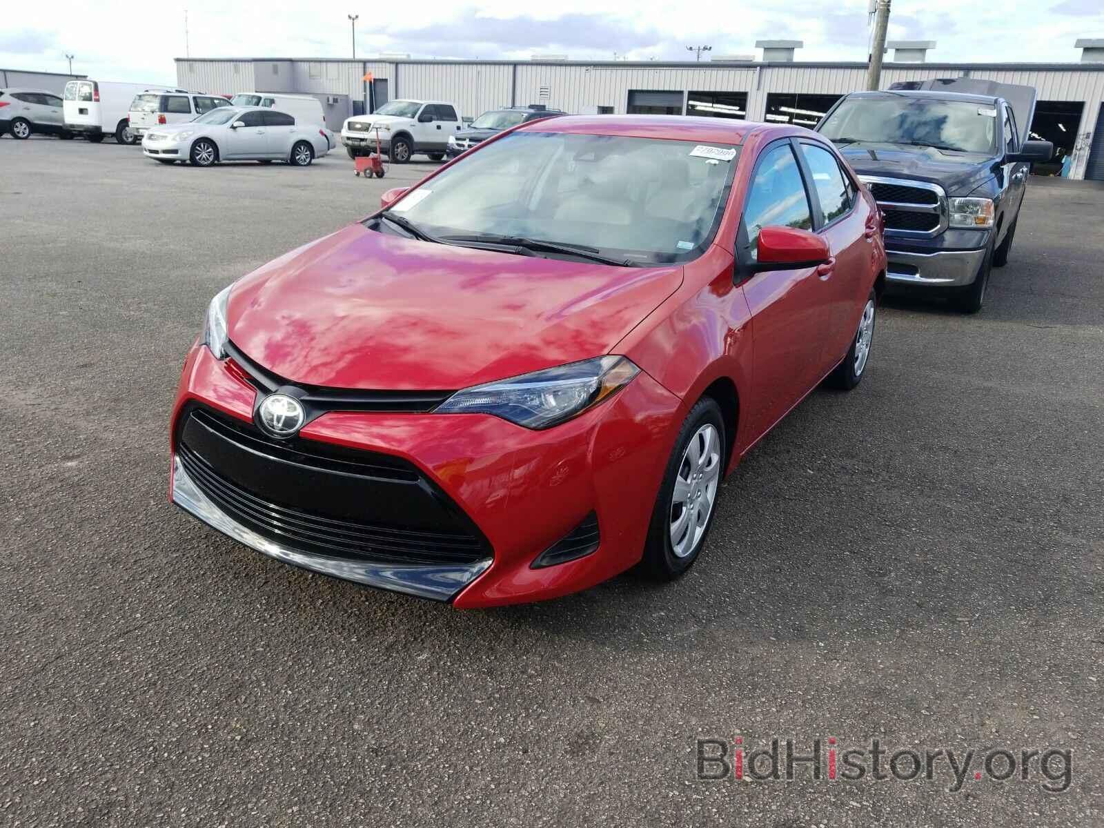 Photo 5YFBURHE3KP937998 - Toyota Corolla LE 2019