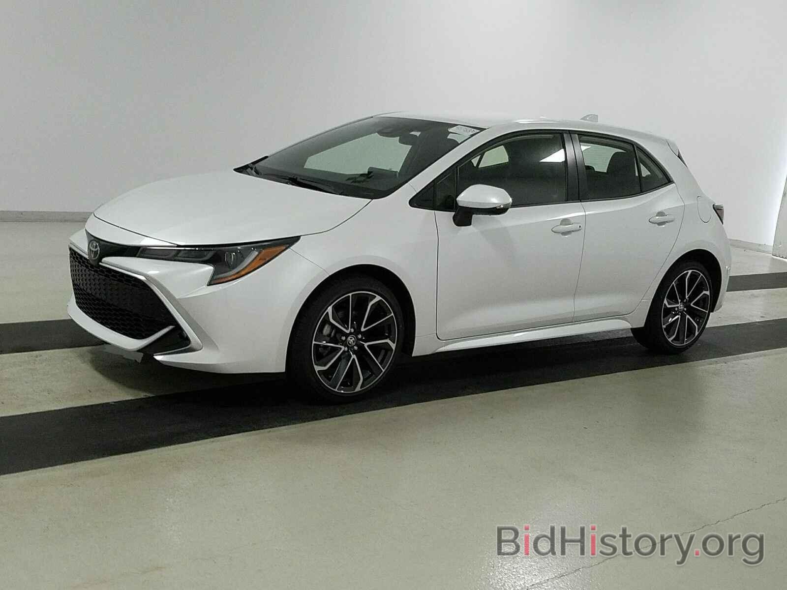 Photo JTNA4MBE3M3105978 - Toyota Corolla Hatchback 2021