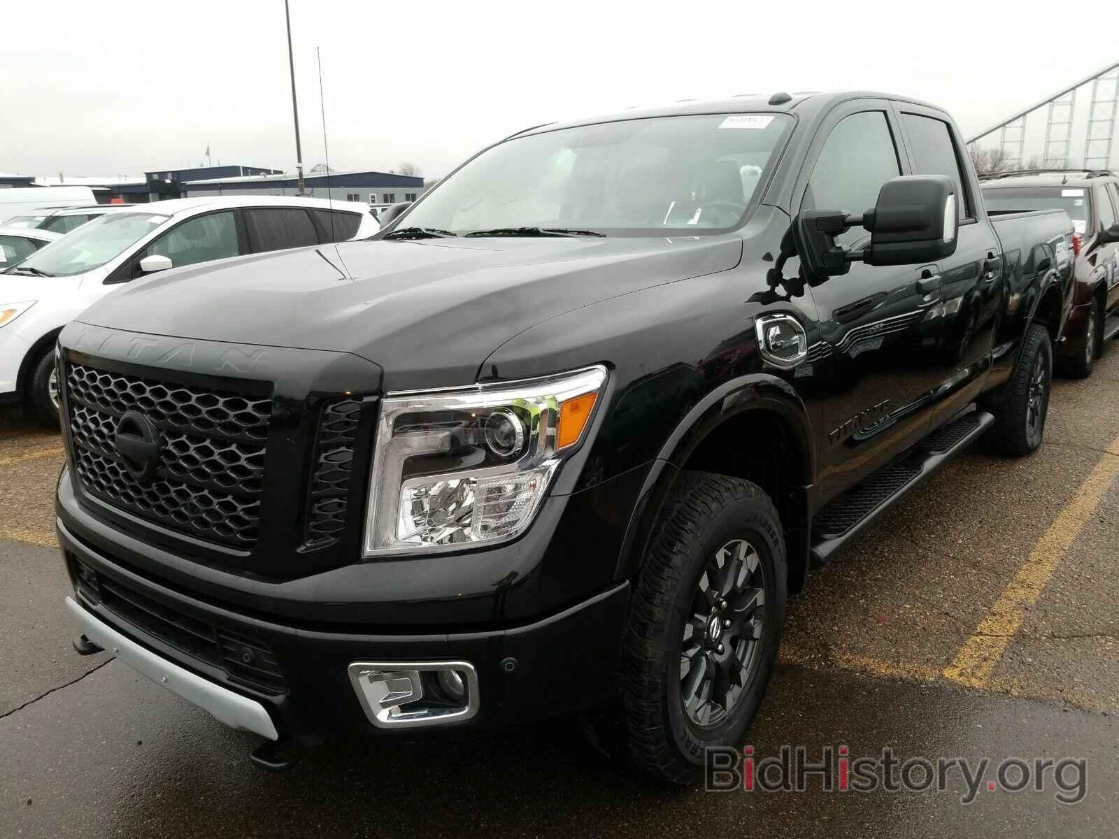 Photo 1N6BA1F44KN517651 - Nissan Titan XD 2019