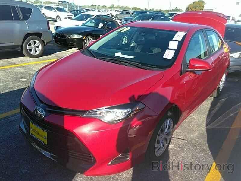 Photo 5YFBURHE1KP904367 - Toyota Corolla LE 2019