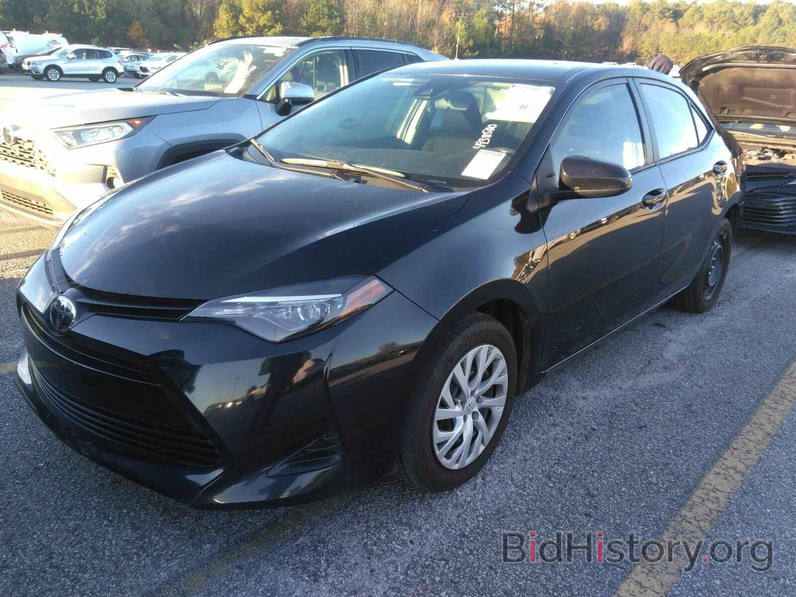 Photo 5YFBURHE1KP944268 - Toyota Corolla LE 2019