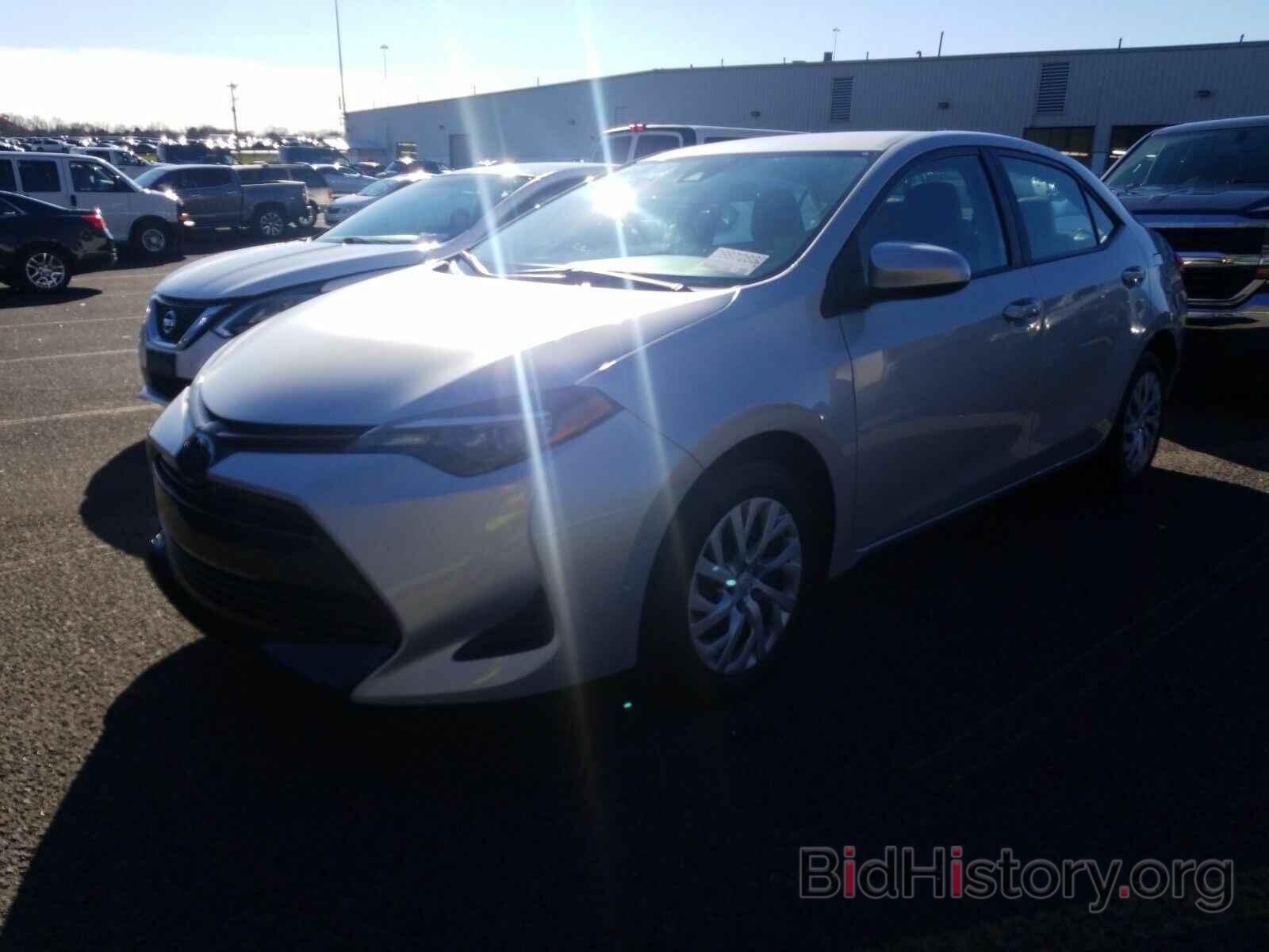 Photo 5YFBURHE2KP931268 - Toyota Corolla LE 2019