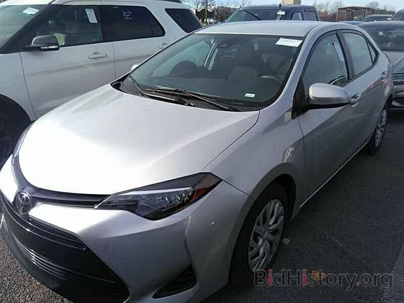 Photo 5YFBURHE7KP904163 - Toyota Corolla LE 2019