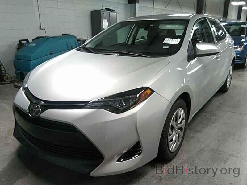 Photo 5YFBURHE3KP874319 - Toyota Corolla LE 2019