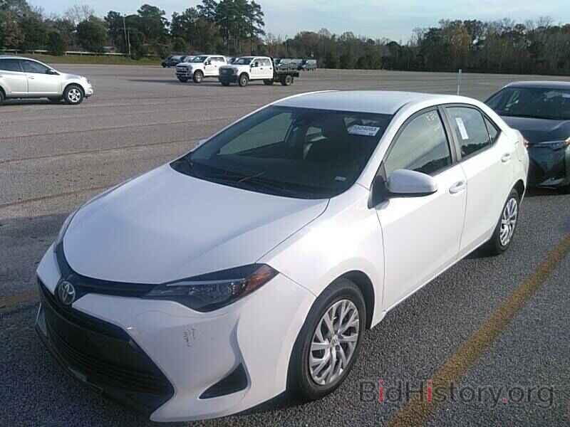 Photo 5YFBURHE5KP884799 - Toyota Corolla LE 2019