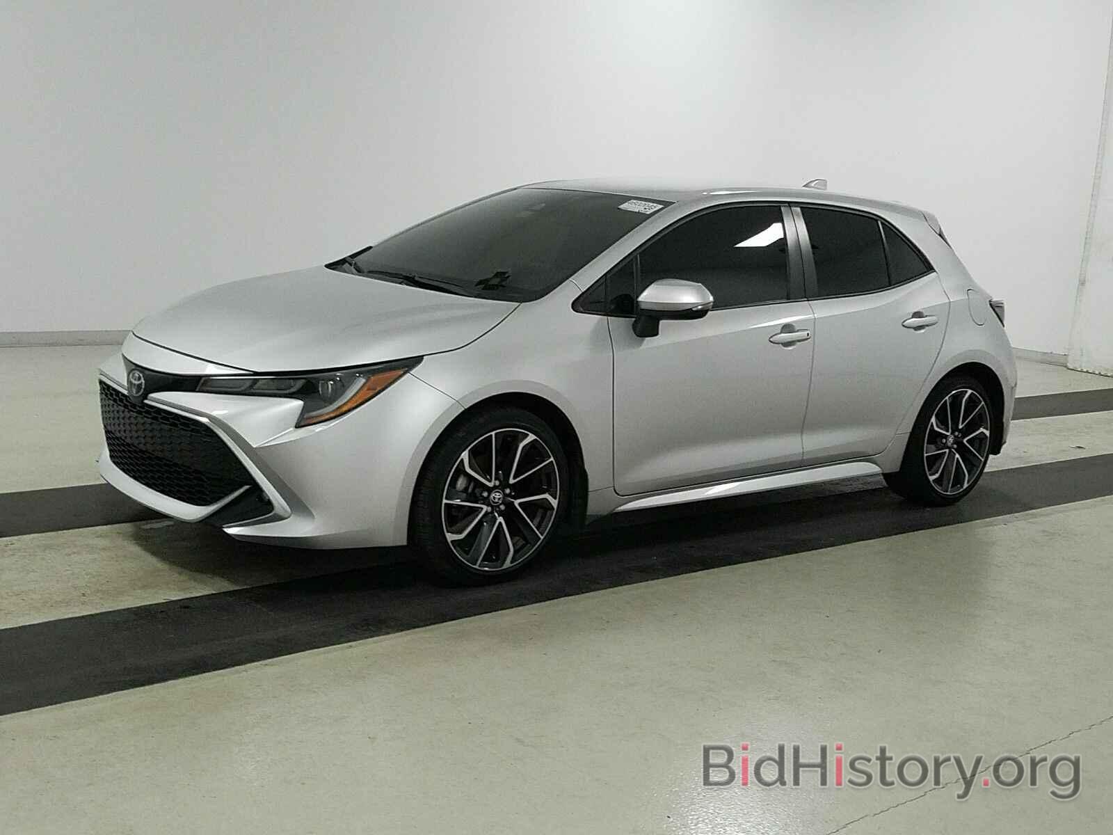 Photo JTNK4RBE5K3008084 - Toyota Corolla Hatchback 2019