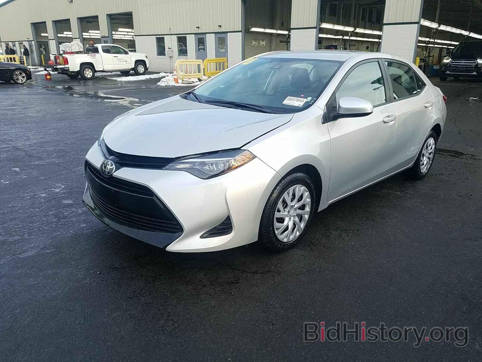 Photo 5YFBURHE6KP906034 - Toyota Corolla LE 2019