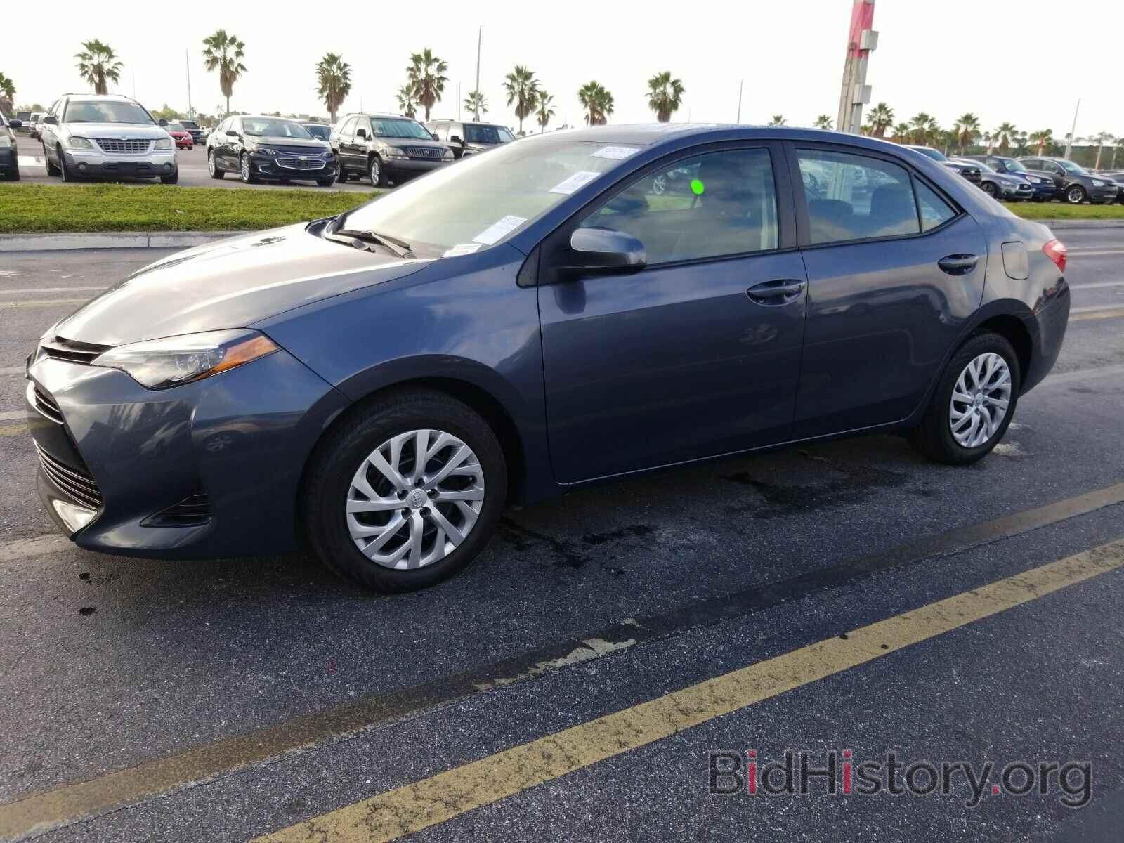 Photo 5YFBURHE3KP920988 - Toyota Corolla LE 2019