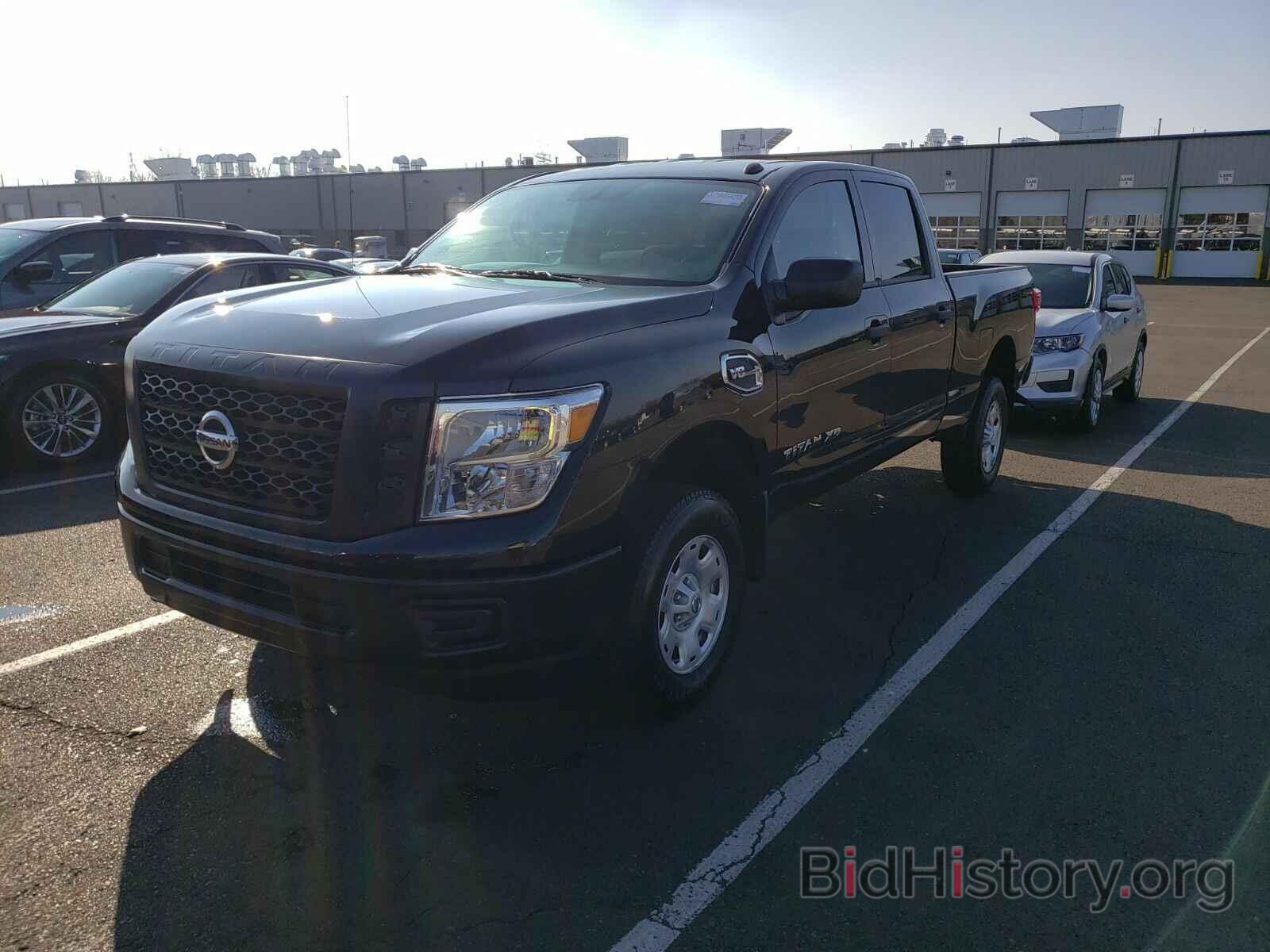 Фотография 1N6AA1F36KN529318 - Nissan Titan XD 2019