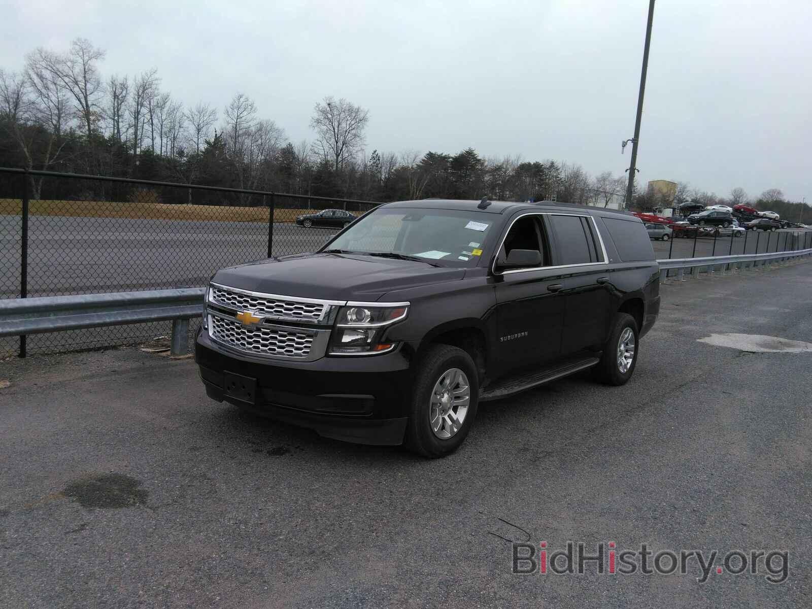 Photo 1GNSKHKC6KR142061 - Chevrolet Suburban 2019