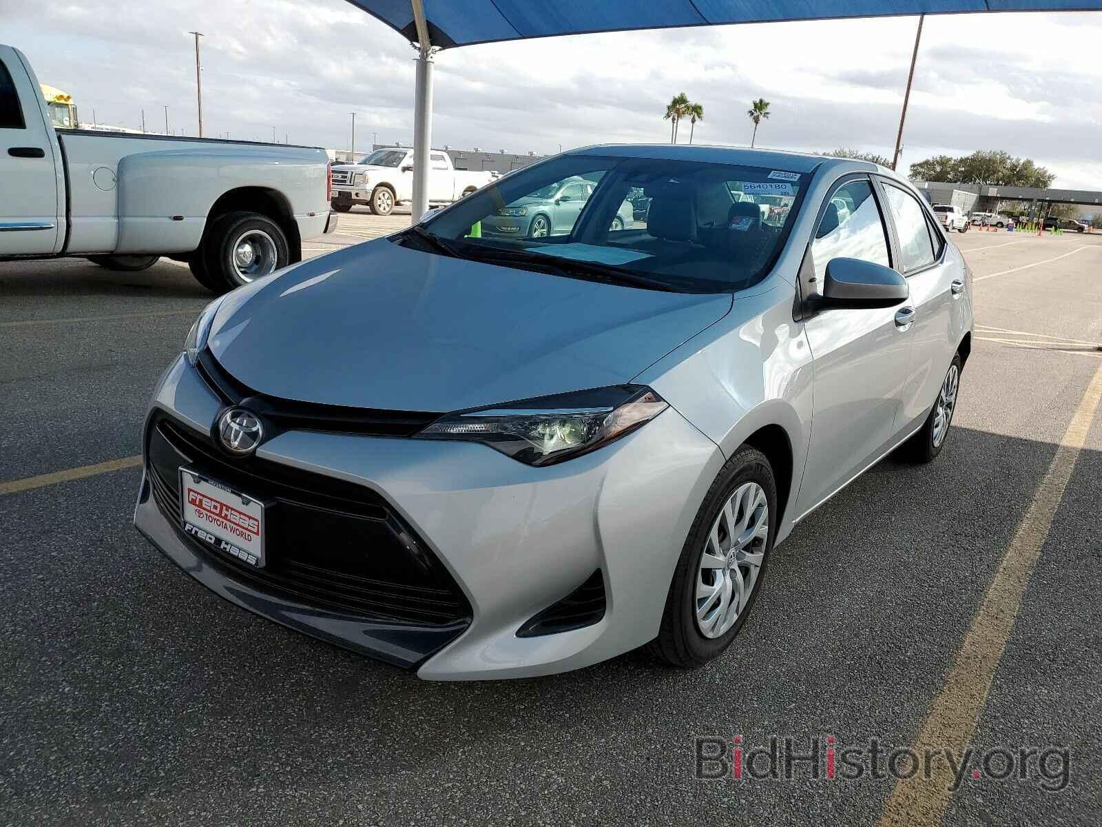 Photo 5YFBURHE4KP910311 - Toyota Corolla LE 2019