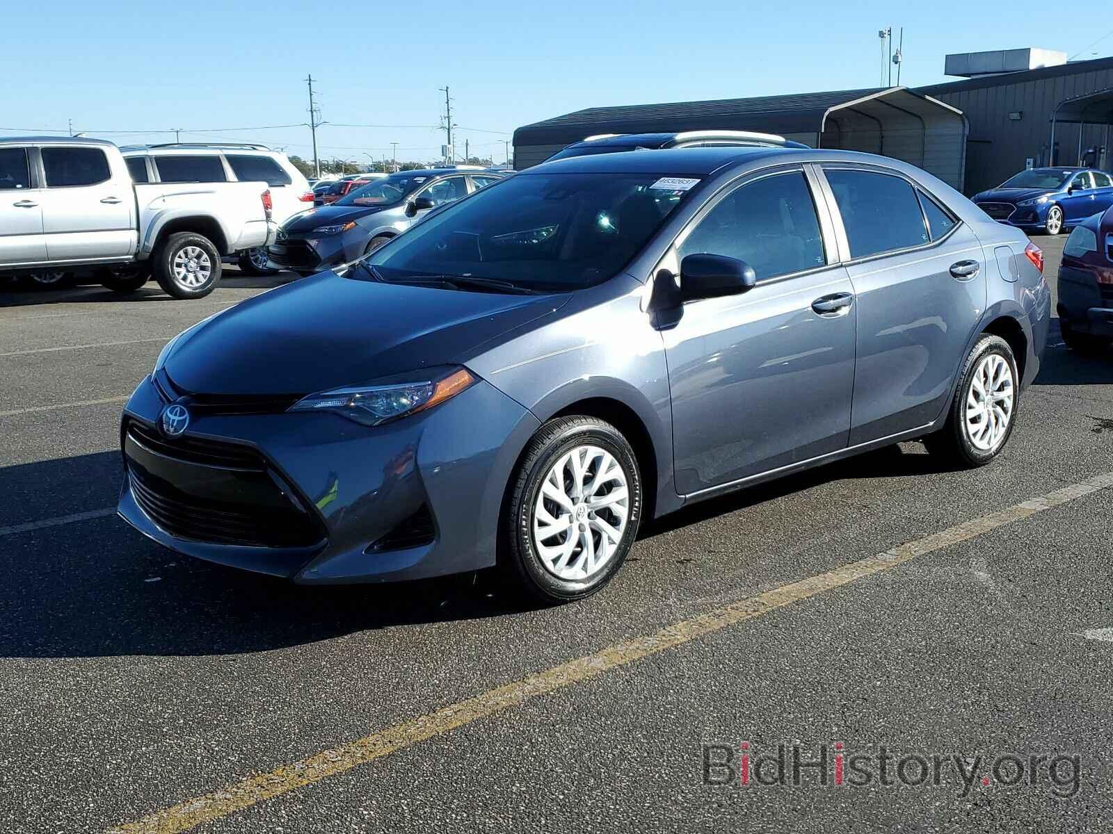 Photo 5YFBURHE9KP866113 - Toyota Corolla LE 2019