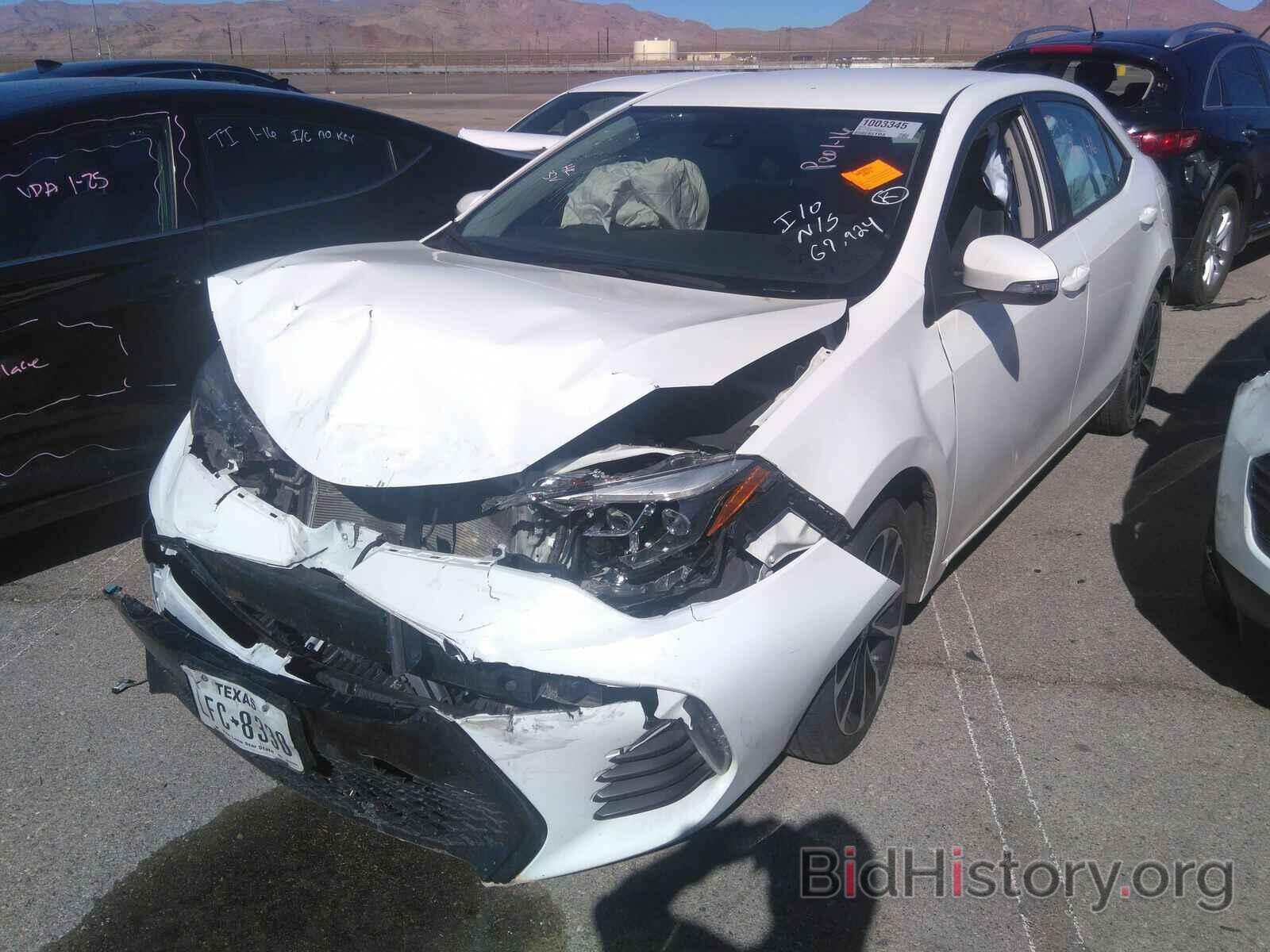 Photo 5YFBURHE3KP884784 - Toyota Corolla 2019