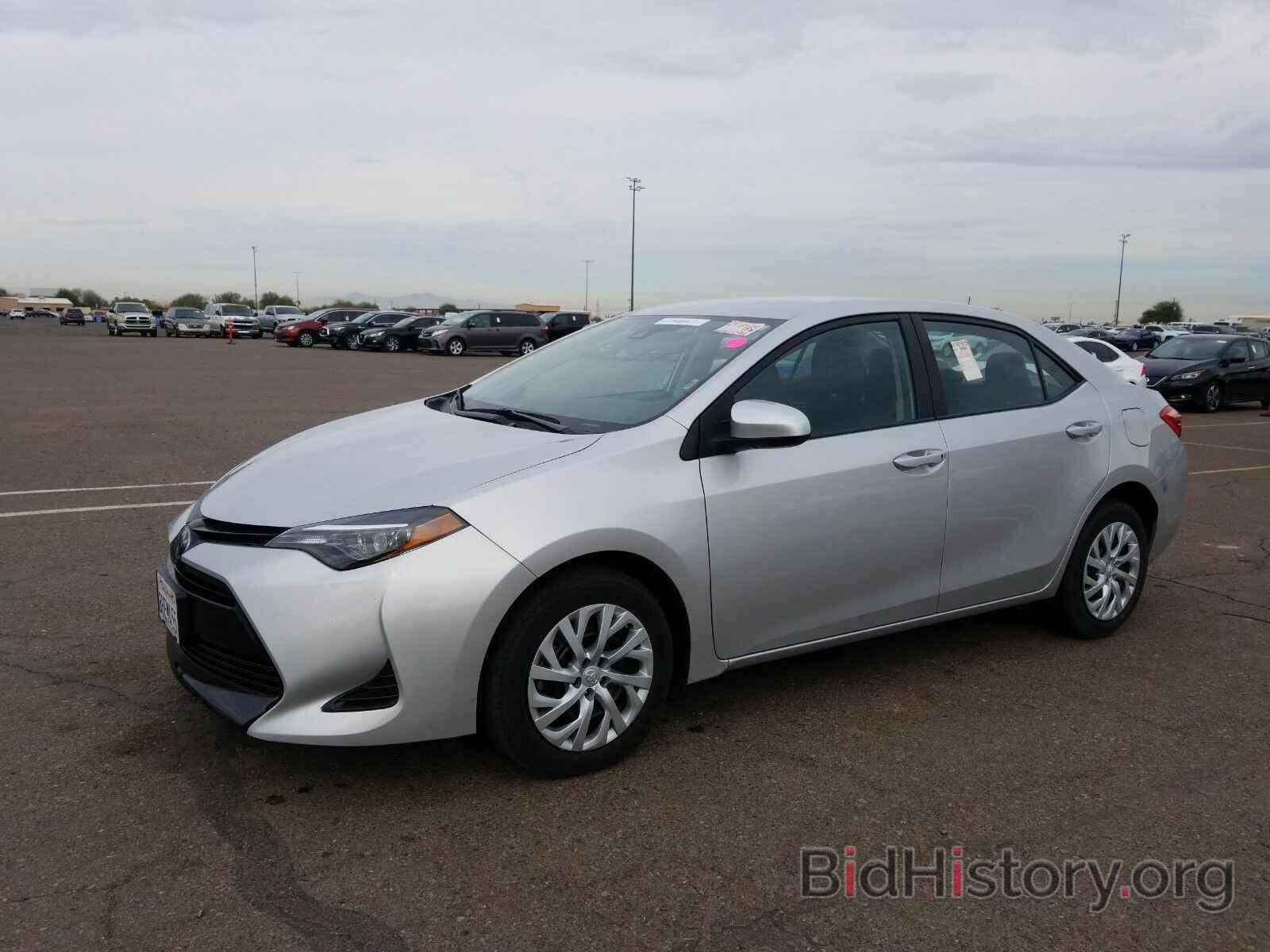 Photo 5YFBURHE9KP920851 - Toyota Corolla LE 2019