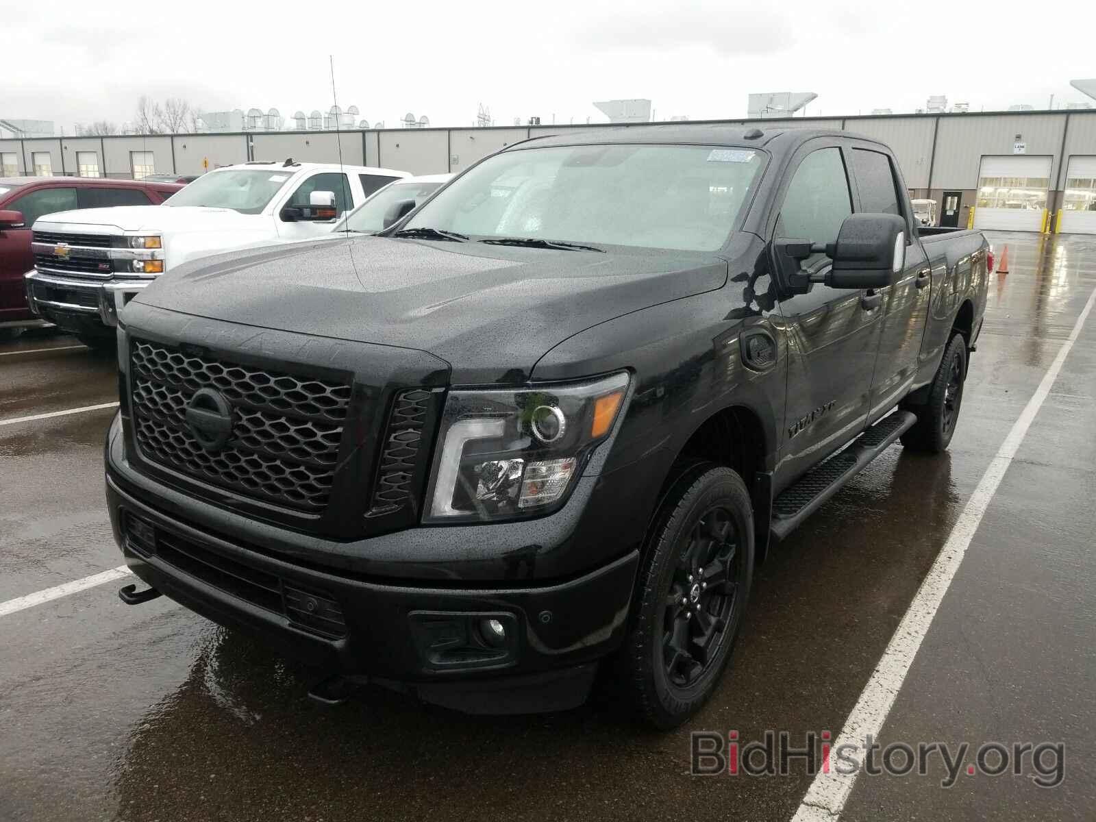 Фотография 1N6BA1F4XKN534423 - Nissan Titan XD 2019