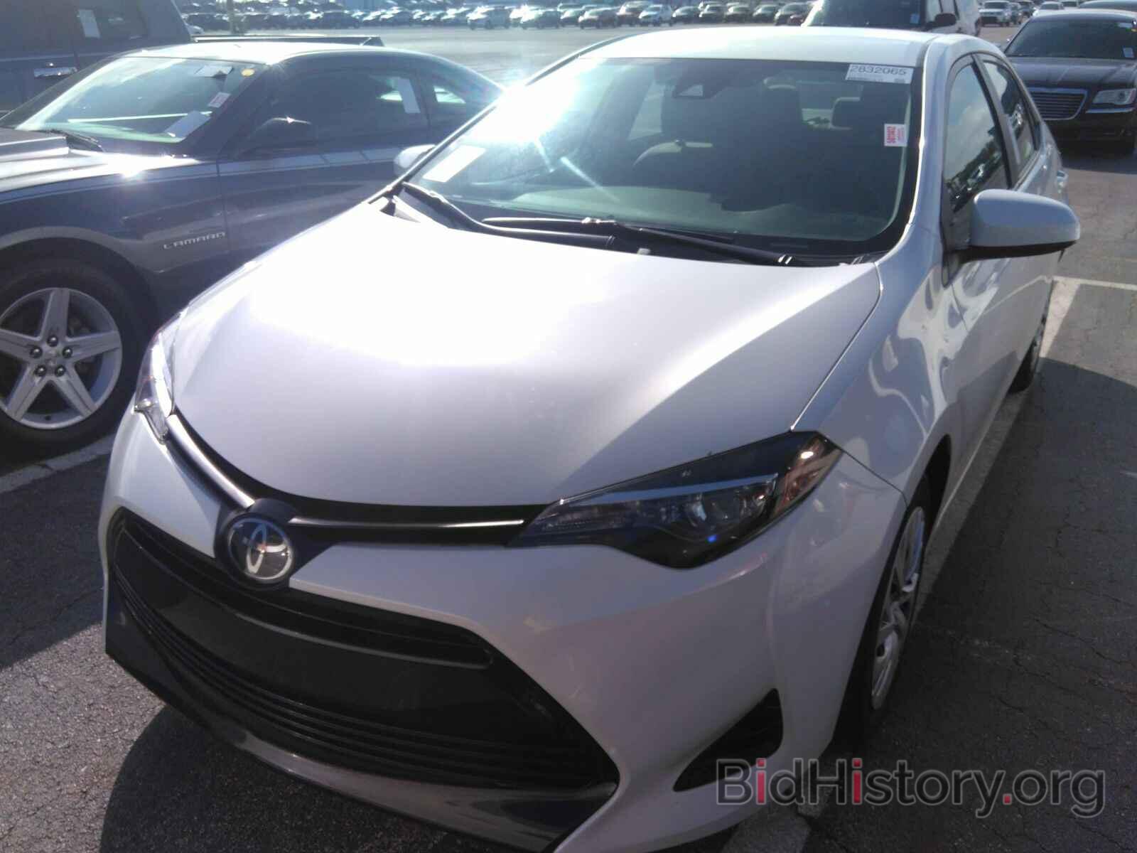 Фотография 5YFBURHE3KP906671 - Toyota Corolla LE 2019