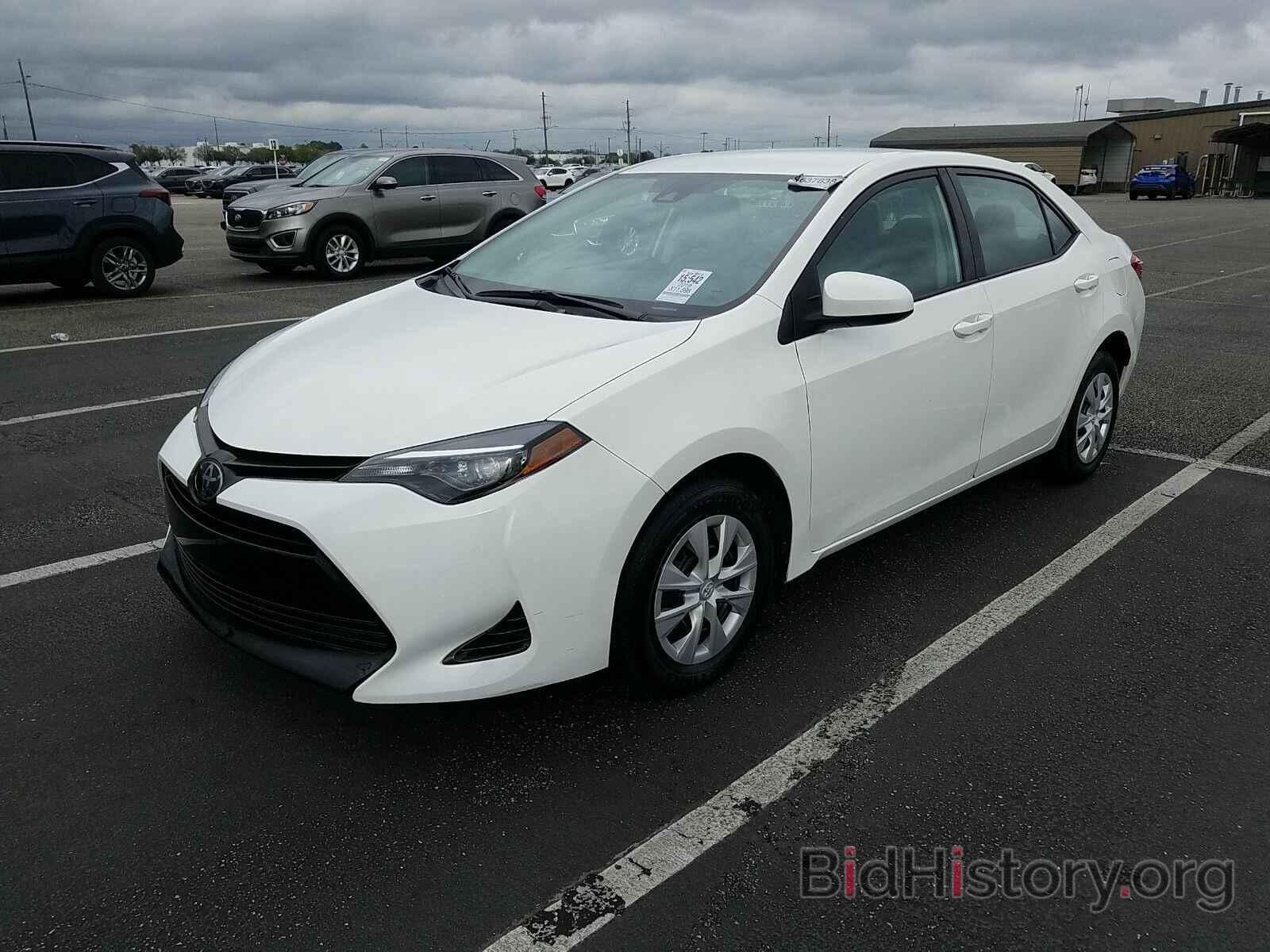 Photo 5YFBURHEXKP861261 - Toyota Corolla 2019