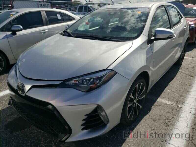 Photo 5YFBURHEXKP857694 - Toyota Corolla 2019