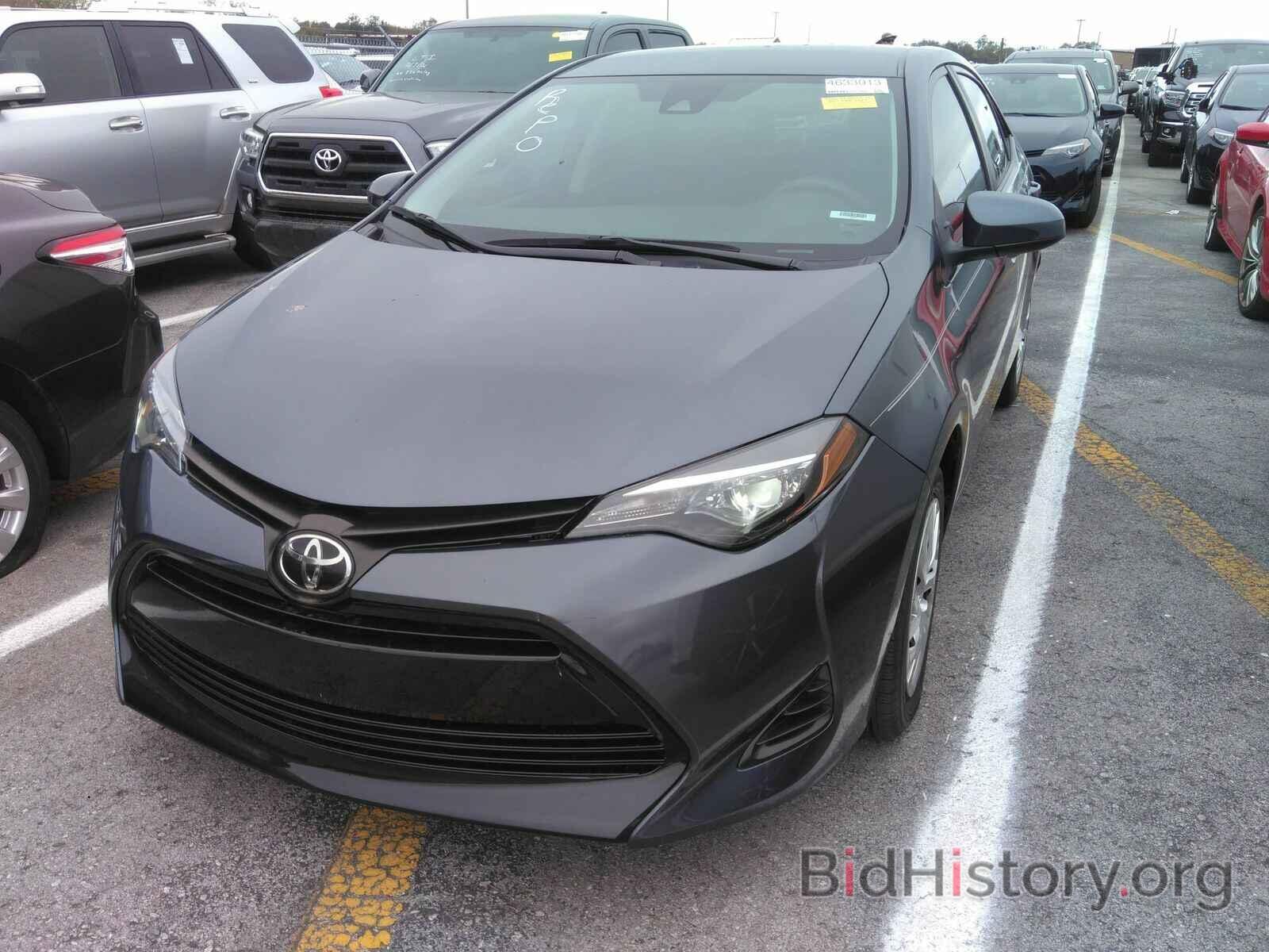 Photo 5YFBURHE4KP942031 - Toyota Corolla LE 2019