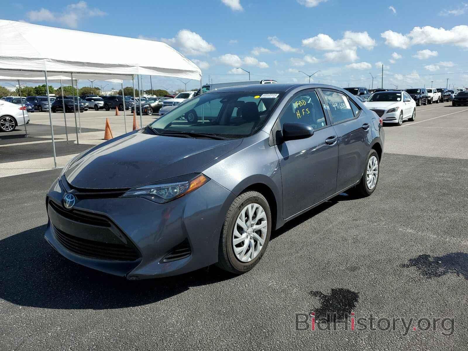 Photo 5YFBURHE4KP935399 - Toyota Corolla LE 2019