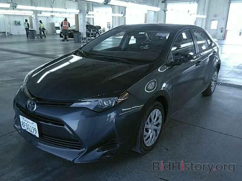 Photo 5YFBURHE2KP887336 - Toyota Corolla LE 2019