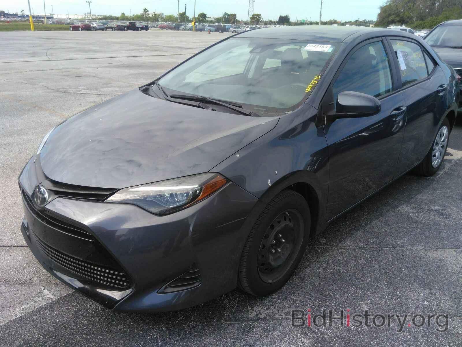 Photo 5YFBURHE5KP937324 - Toyota Corolla LE 2019