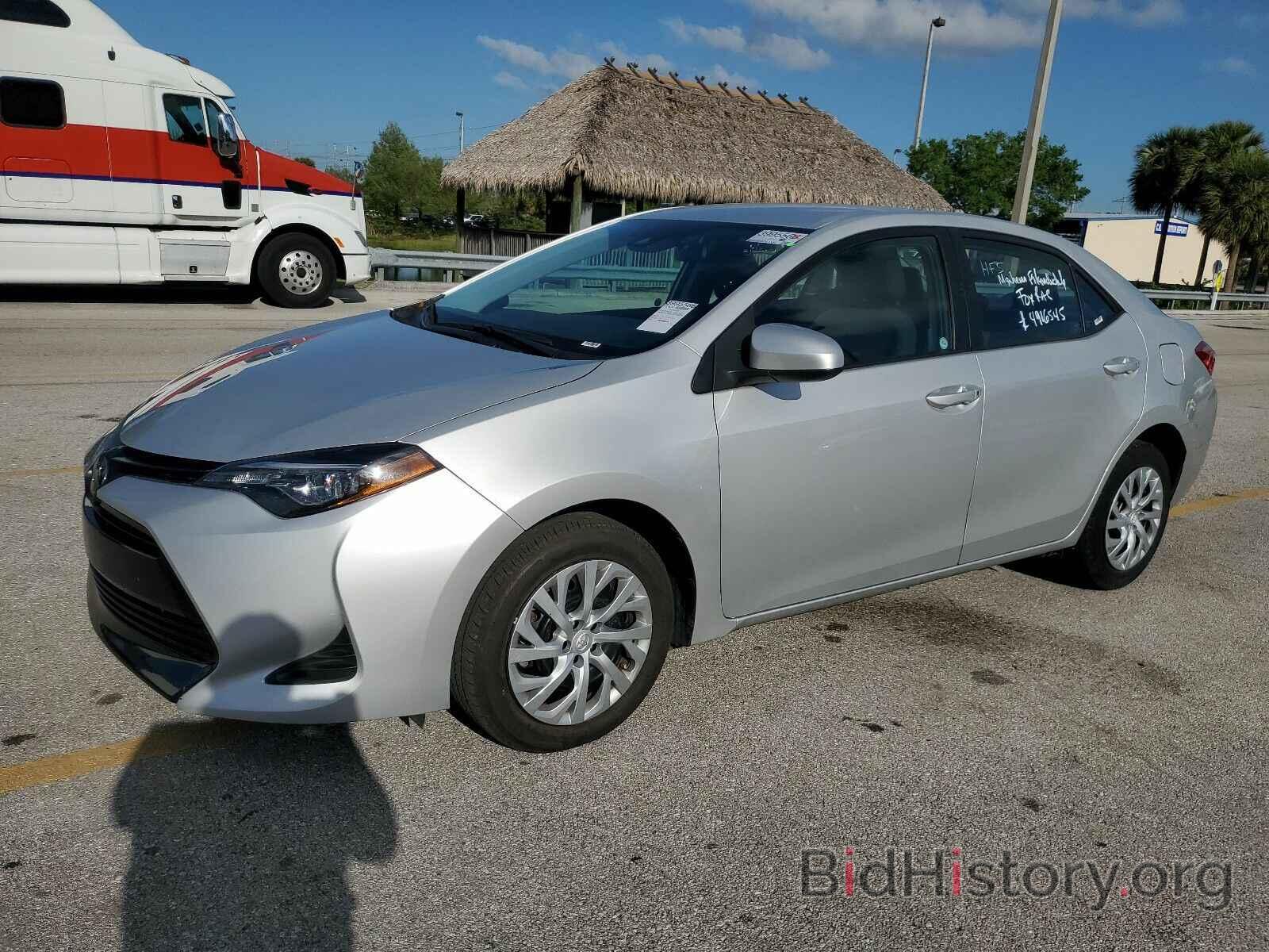 Photo 5YFBURHE7KP936854 - Toyota Corolla LE 2019